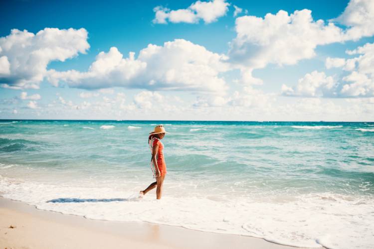 woman walking on cape san blas beach